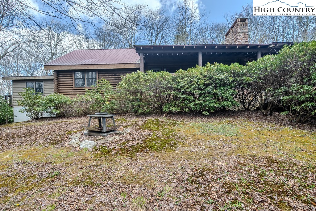 80 Avery Co High School Road Newland, NC 28657 - Photo 29 of 36 a front view of a house with garden