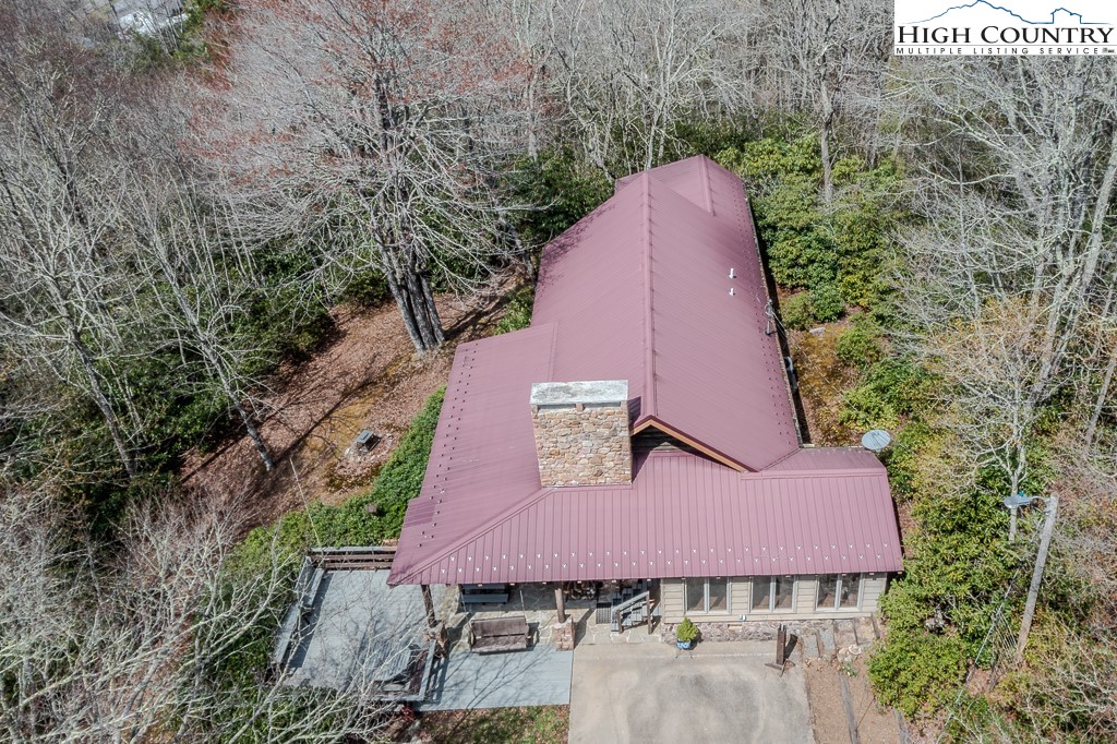 80 Avery Co High School Road Newland, NC 28657 - Photo 33 of 36 an aerial view of a house with a yard