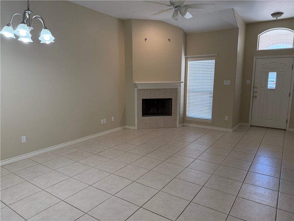 15210 Cruiser Street Corpus Christi, TX 78418 - Photo 2 of 12 a view of an empty room with a fireplace