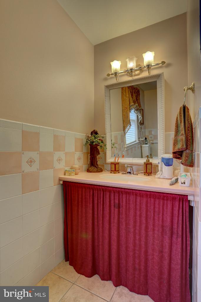 30 Pinewood Avenue Lititz, PA 17543 - Photo 13 of 73 a bathroom with a sink and a mirror