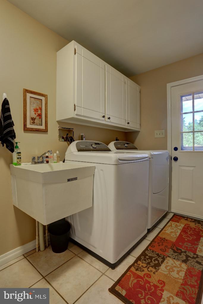 30 Pinewood Avenue Lititz, PA 17543 - Photo 28 of 73 a room with a sink cabinets and utility room