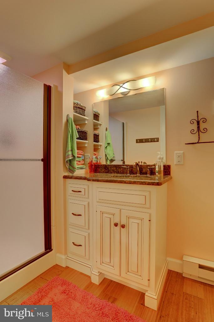 30 Pinewood Avenue Lititz, PA 17543 - Photo 38 of 73 a bathroom with a sink and a mirror