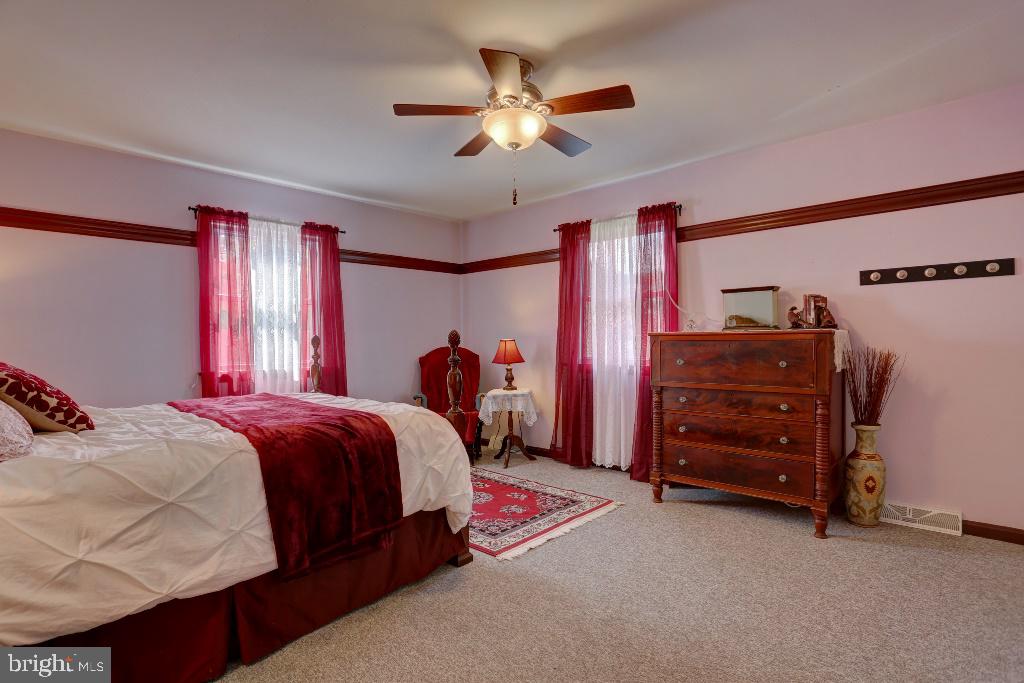 30 Pinewood Avenue Lititz, PA 17543 - Photo 42 of 73 a bed room with a bed and a ceiling fan