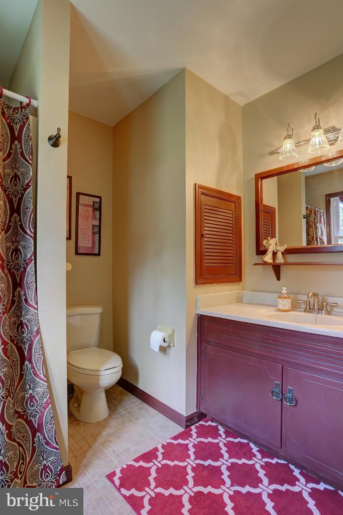 30 Pinewood Avenue Lititz, PA 17543 - Photo 44 of 73 a bathroom with a sink and a mirror