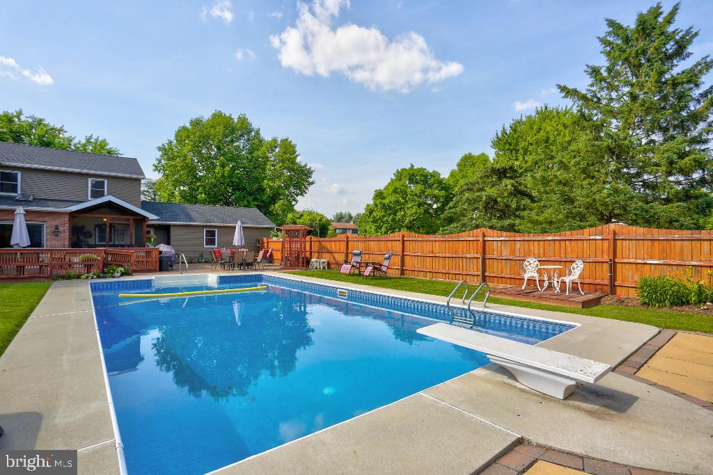 30 Pinewood Avenue Lititz, PA 17543 - Photo 57 of 73 a view of a swimming pool with a lounge chairs