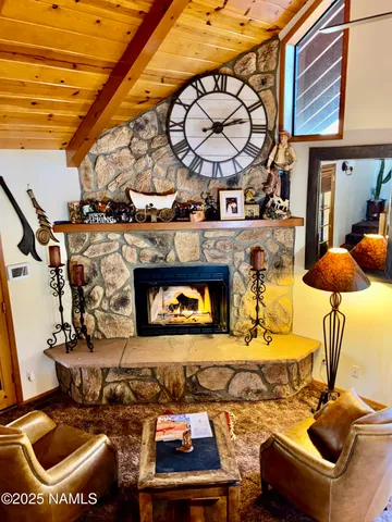 a view of a balcony with wooden floor