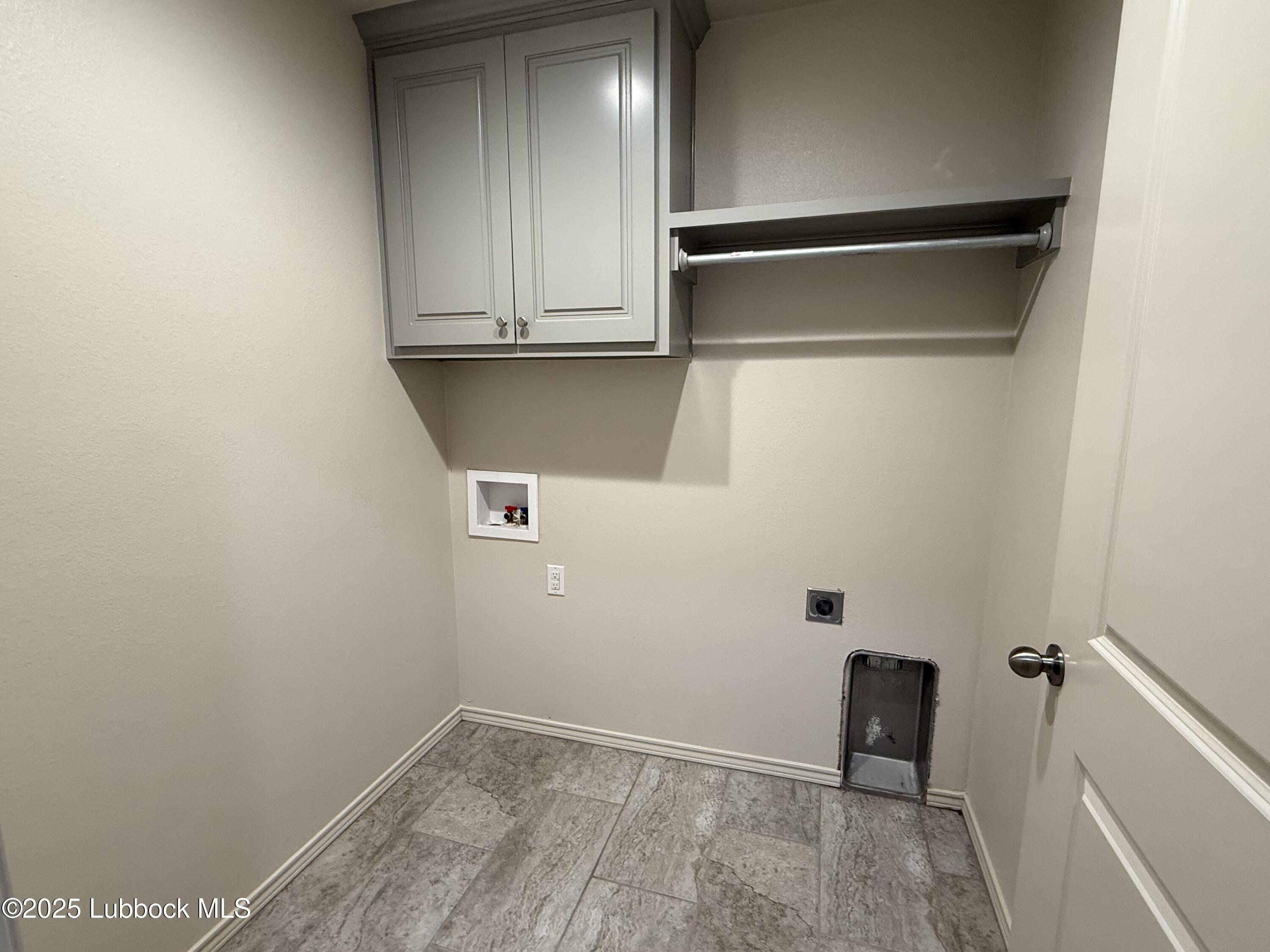 6711 Pontiac Avenue, Unit 12 Lubbock, TX 79424 - Photo 11 of 14 a view of utility room