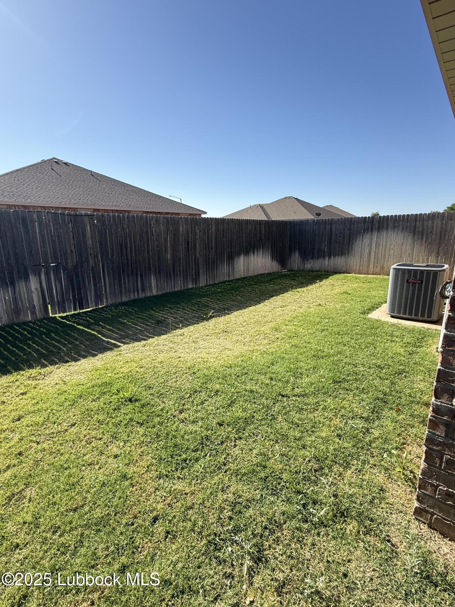 6711 Pontiac Avenue, Unit 12 Lubbock, TX 79424 - Photo 14 of 14 a view of a back yard