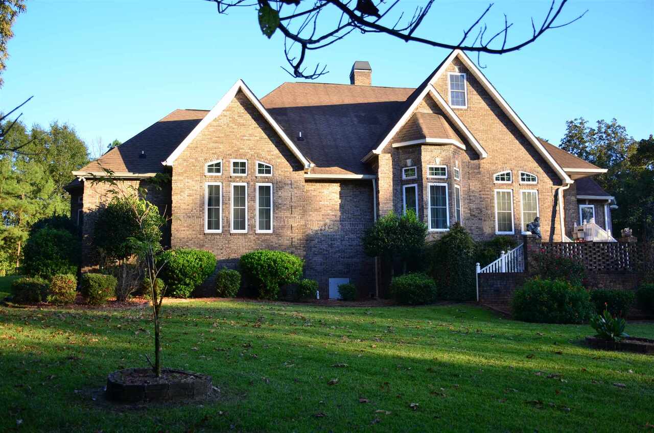 a house view with a garden space