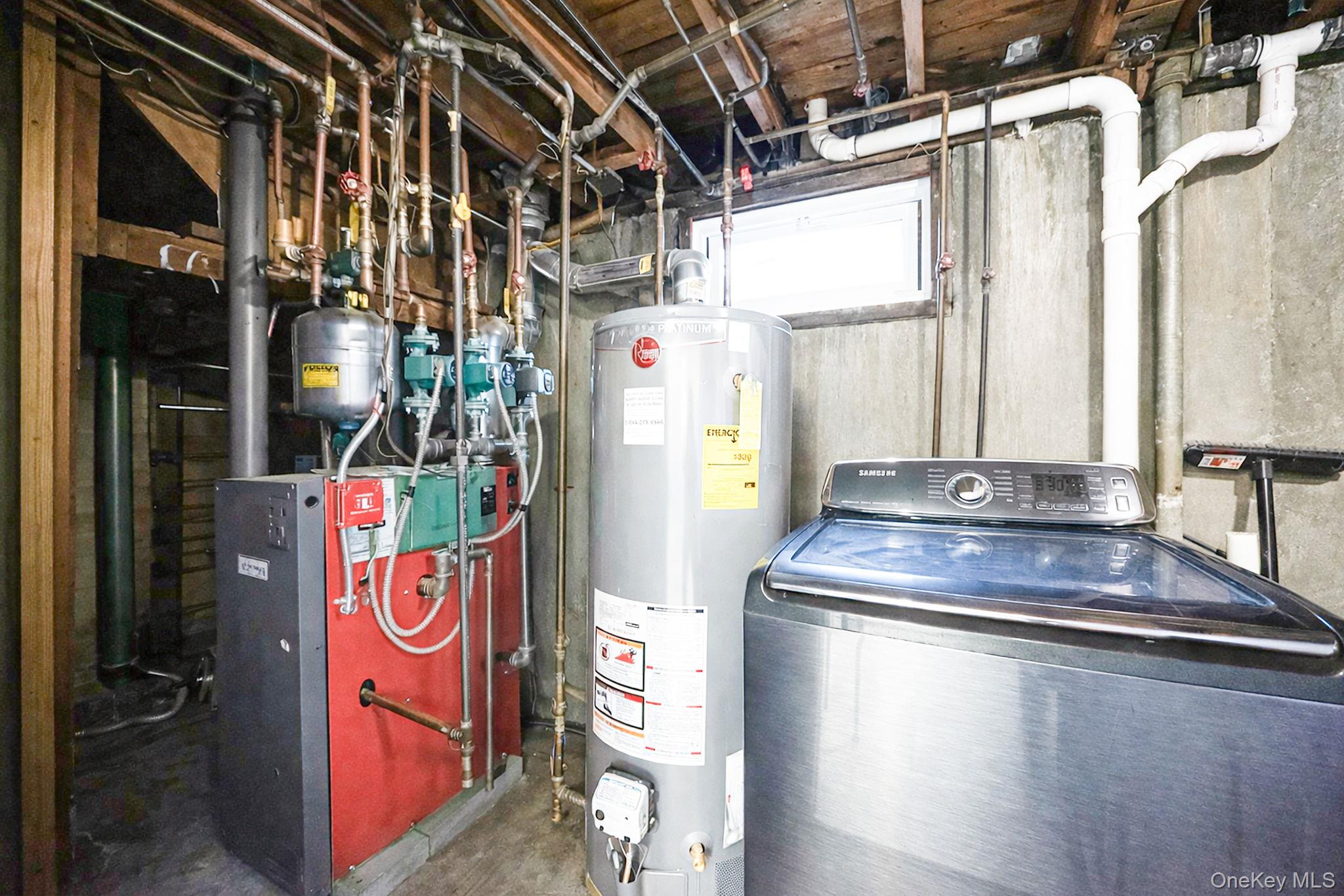 220-53 137th Road Queens, NY 11413 - Photo 35 of 41 a view of water heater room with stainless steel appliances
