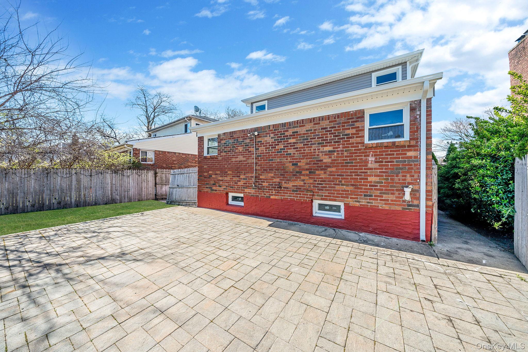 220-53 137th Road Queens, NY 11413 - Photo 37 of 41 a view of a backyard
