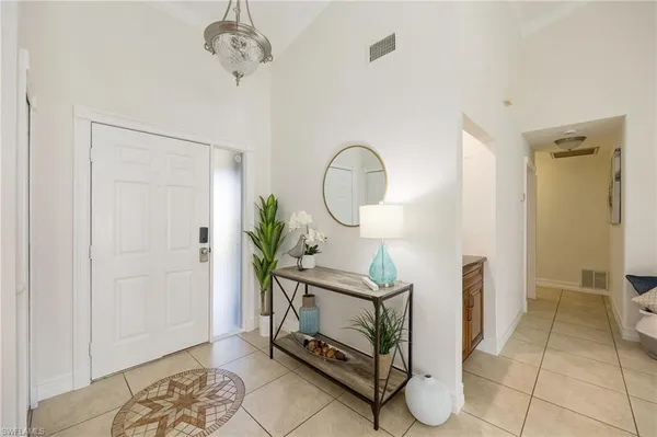 $430,000 | 113 Quail Hollow Court, Unit 1460, Naples, FL 34113