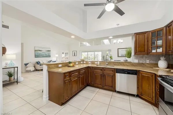 $430,000 | 113 Quail Hollow Court, Unit 1460, Naples, FL 34113