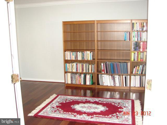 10414 Mountain Quail Road Silver Spring, MD 20901 - Photo 1 of 22 a view of wooden floor in a living room