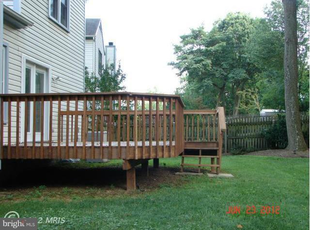 10414 Mountain Quail Road Silver Spring, MD 20901 - Photo 16 of 22 a view of a chair and table in the garden