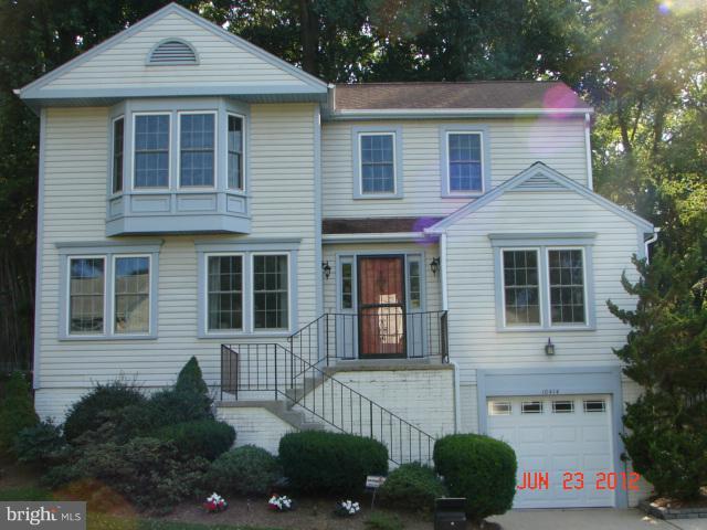 10414 Mountain Quail Road Silver Spring, MD 20901 - Photo 22 of 22 a front view of a house with a yard