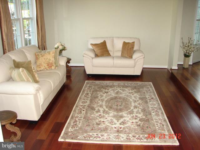 10414 Mountain Quail Road Silver Spring, MD 20901 - Photo 7 of 22 a living room with a couch