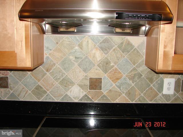 10414 Mountain Quail Road Silver Spring, MD 20901 - Photo 10 of 22 a bathroom with a sink and a vanity