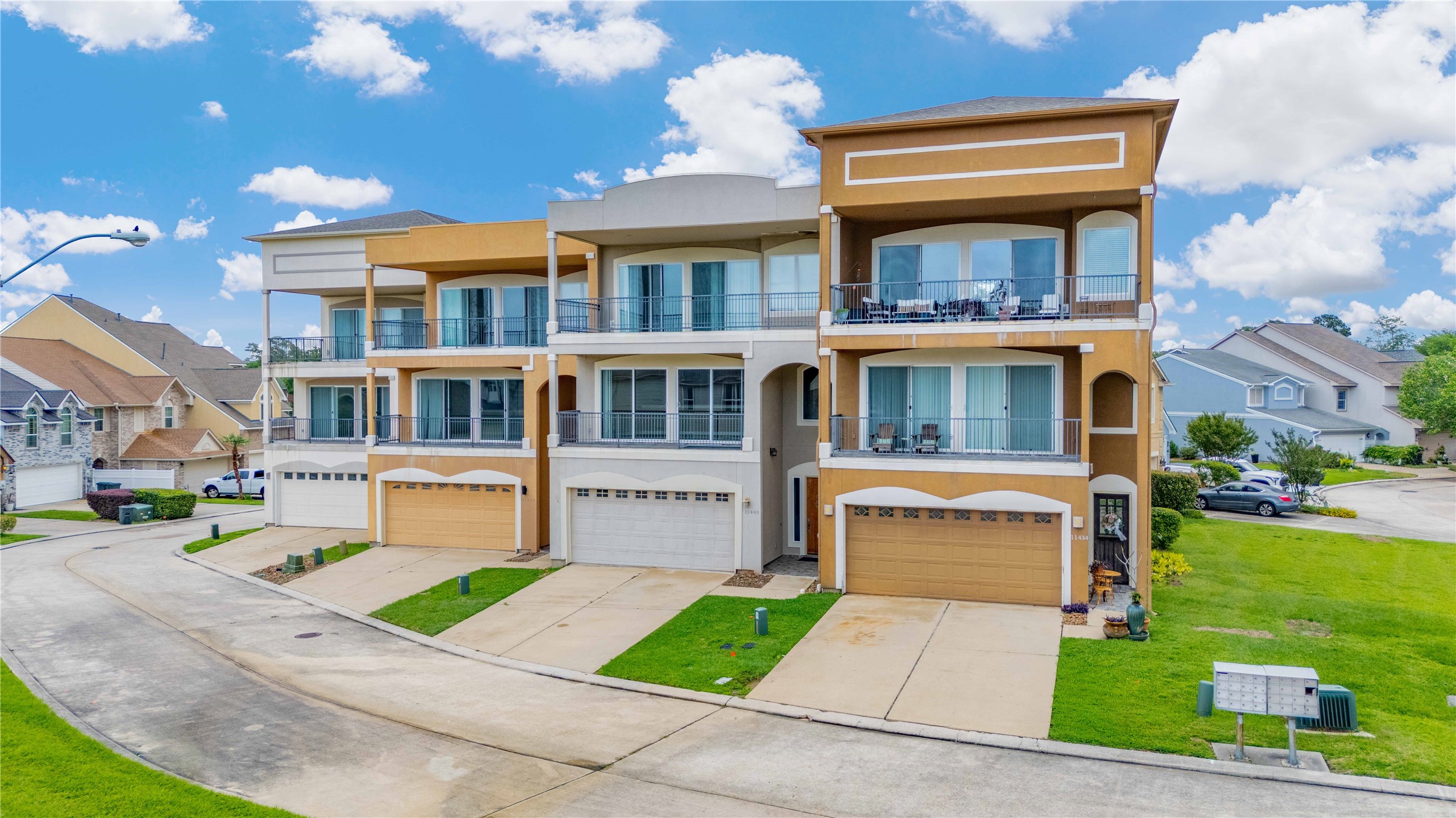 11446 Ketch Court Willis, TX 77318 - Photo 1 of 16 a front view of a building with a garden and plants