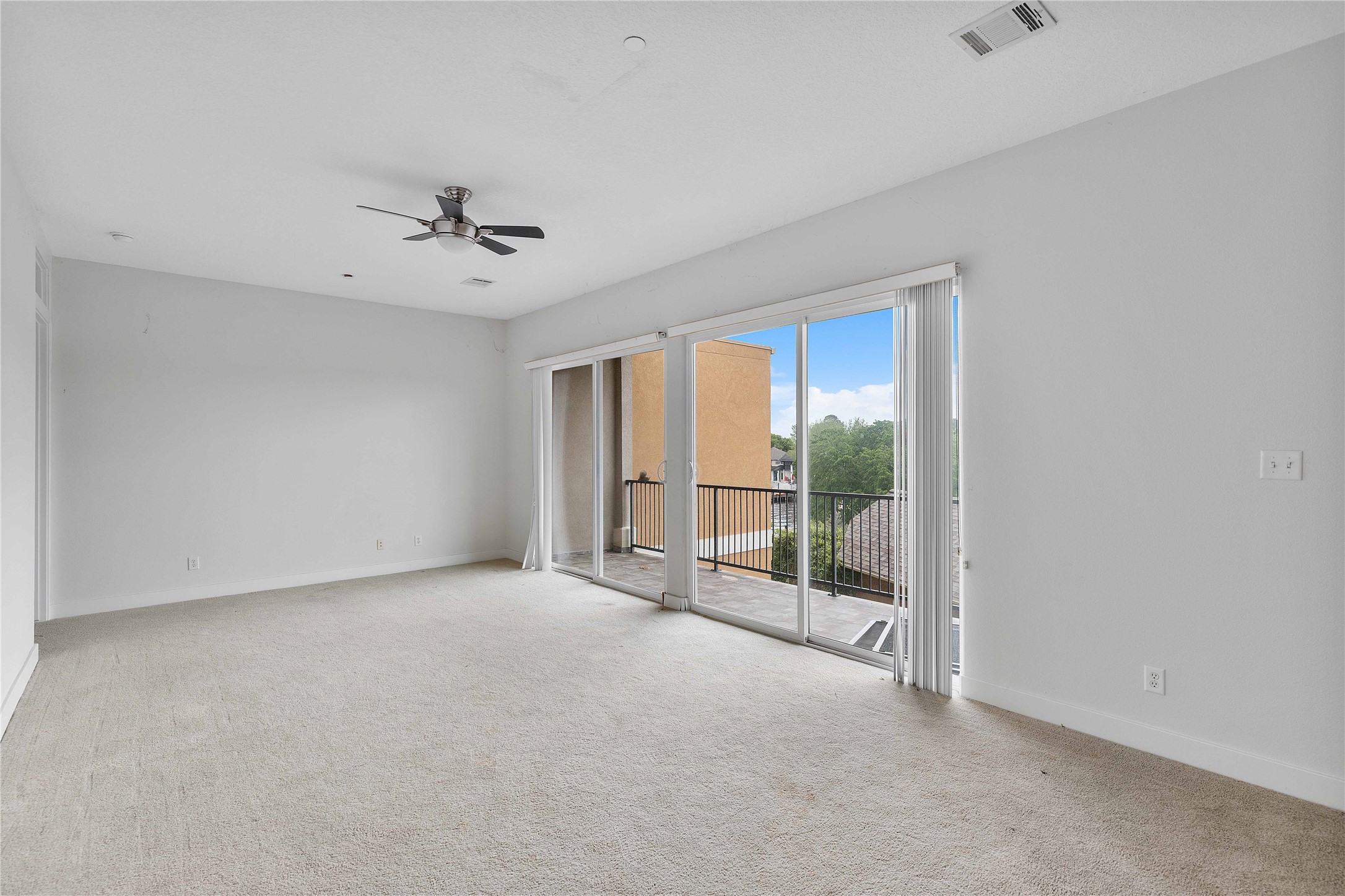 11446 Ketch Court Willis, TX 77318 - Photo 11 of 16 a view of an empty room with a window