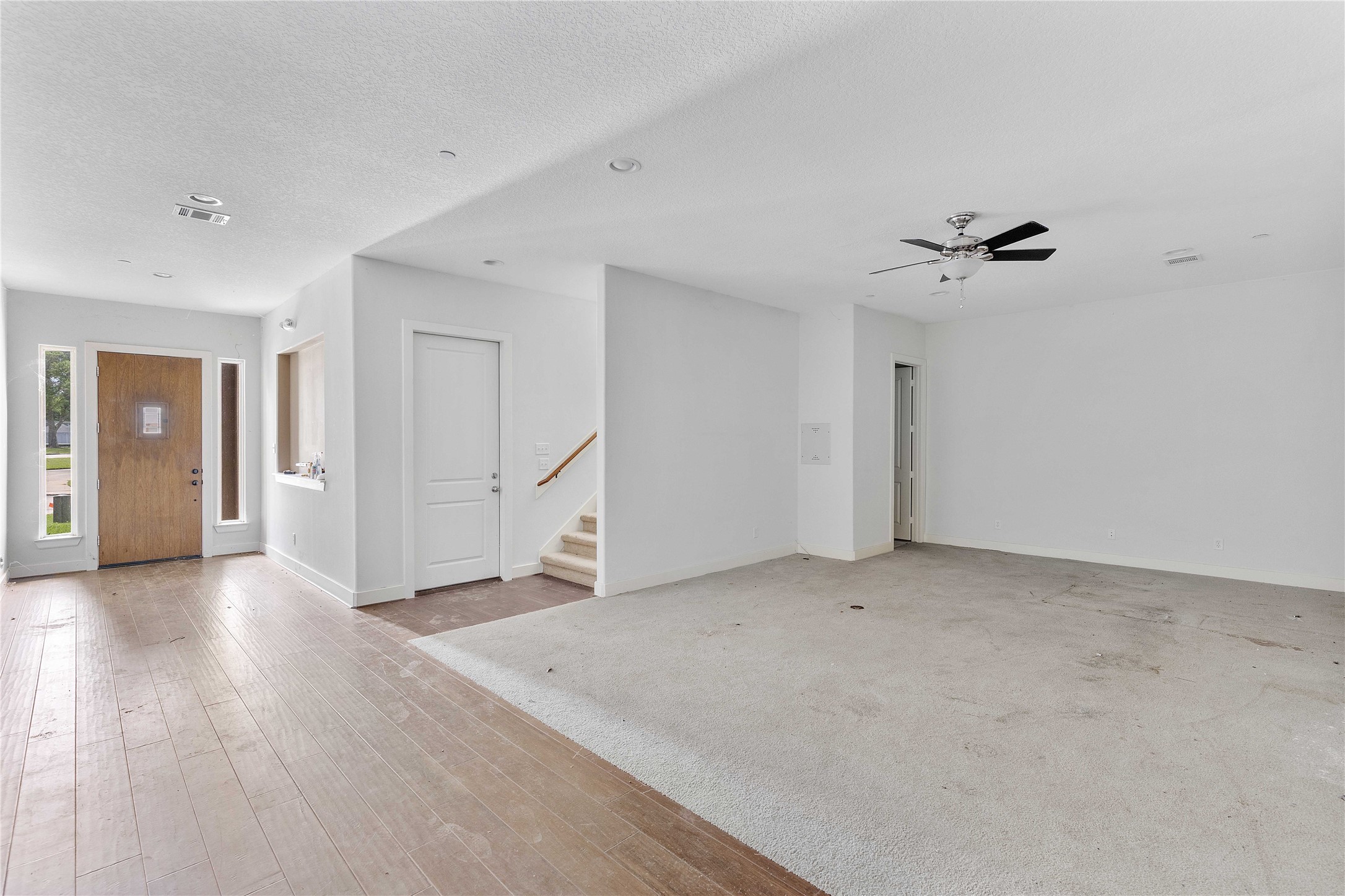 11446 Ketch Court Willis, TX 77318 - Photo 5 of 16 wooden floor in an empty room