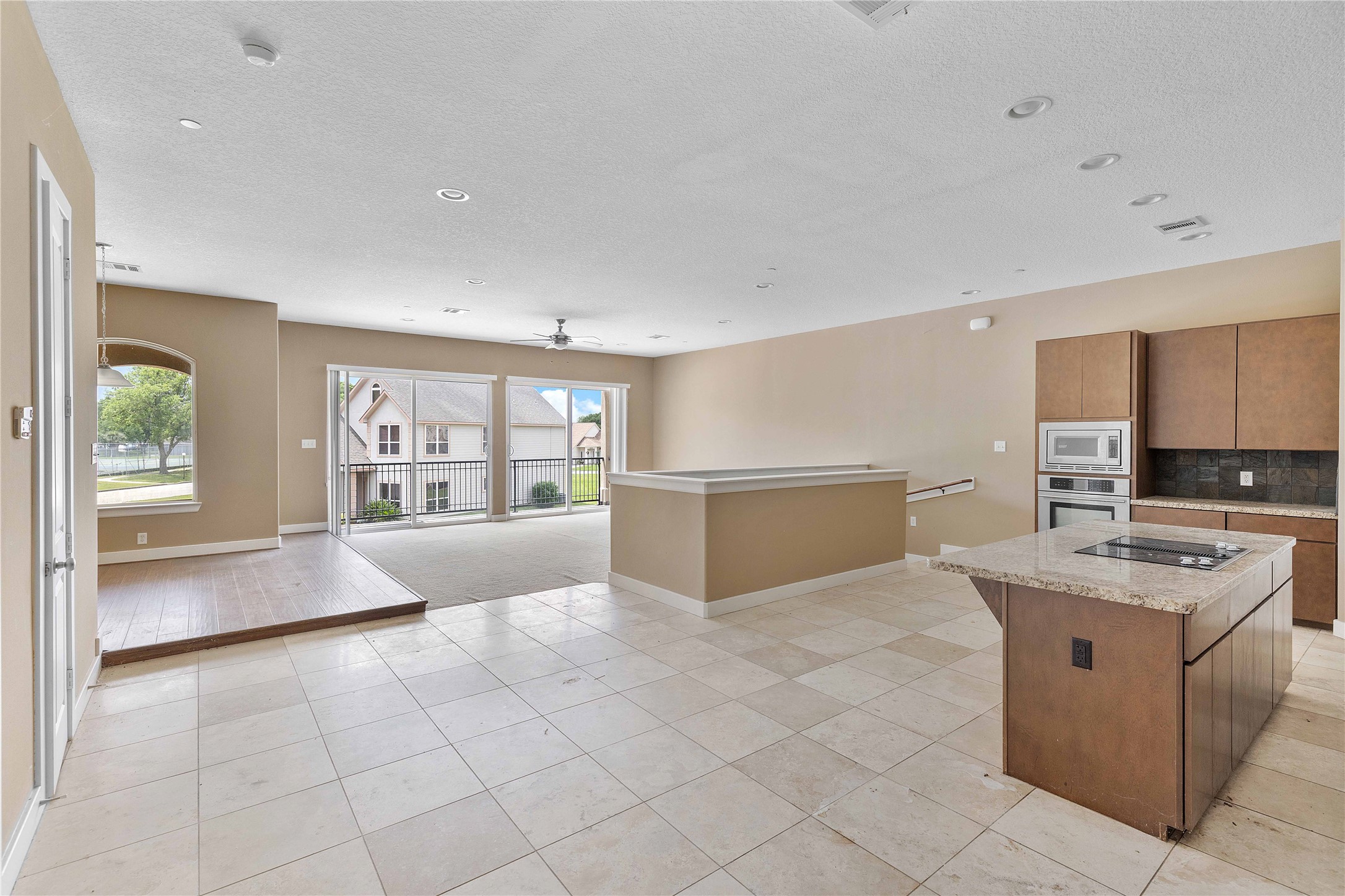 11446 Ketch Court Willis, TX 77318 - Photo 7 of 16 a view of kitchen with granite countertop cabinets and a sink