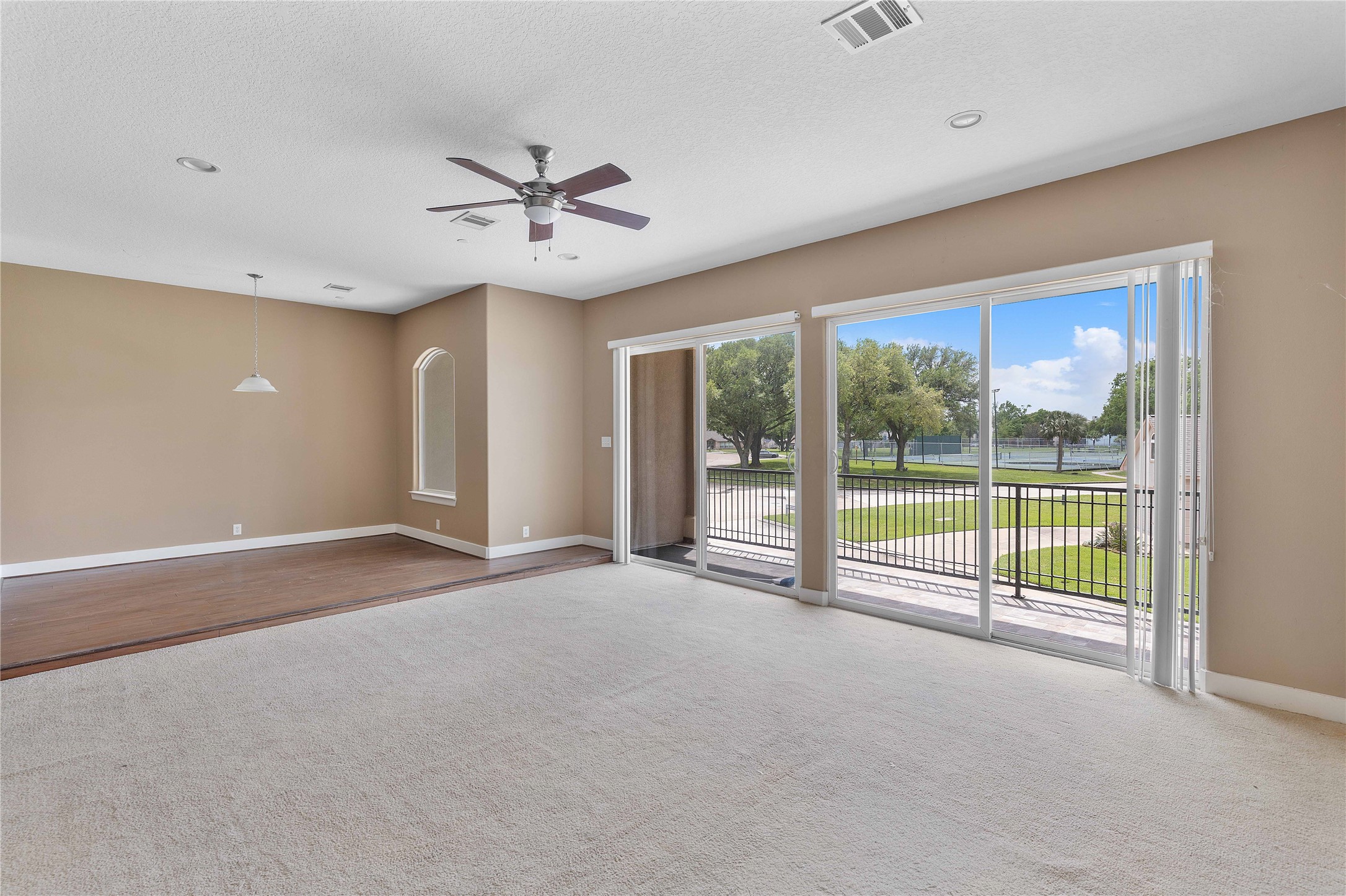 11446 Ketch Court Willis, TX 77318 - Photo 9 of 16 a view of an empty room with a window