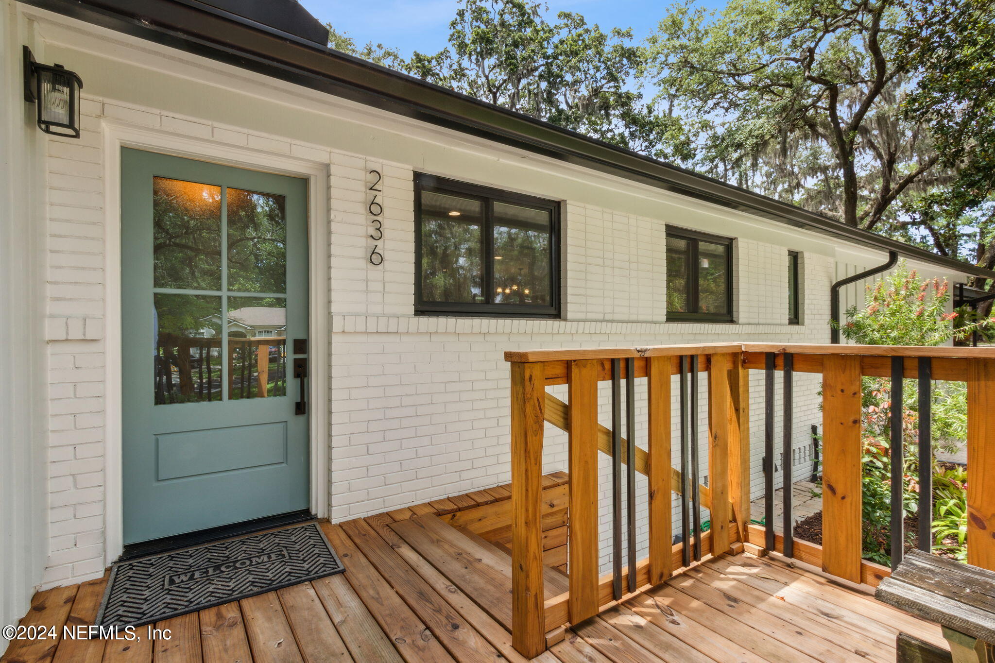 2636 Elbow Road Orange Park, FL 32073 - Photo 1 of 43 a front view of a house with a porch
