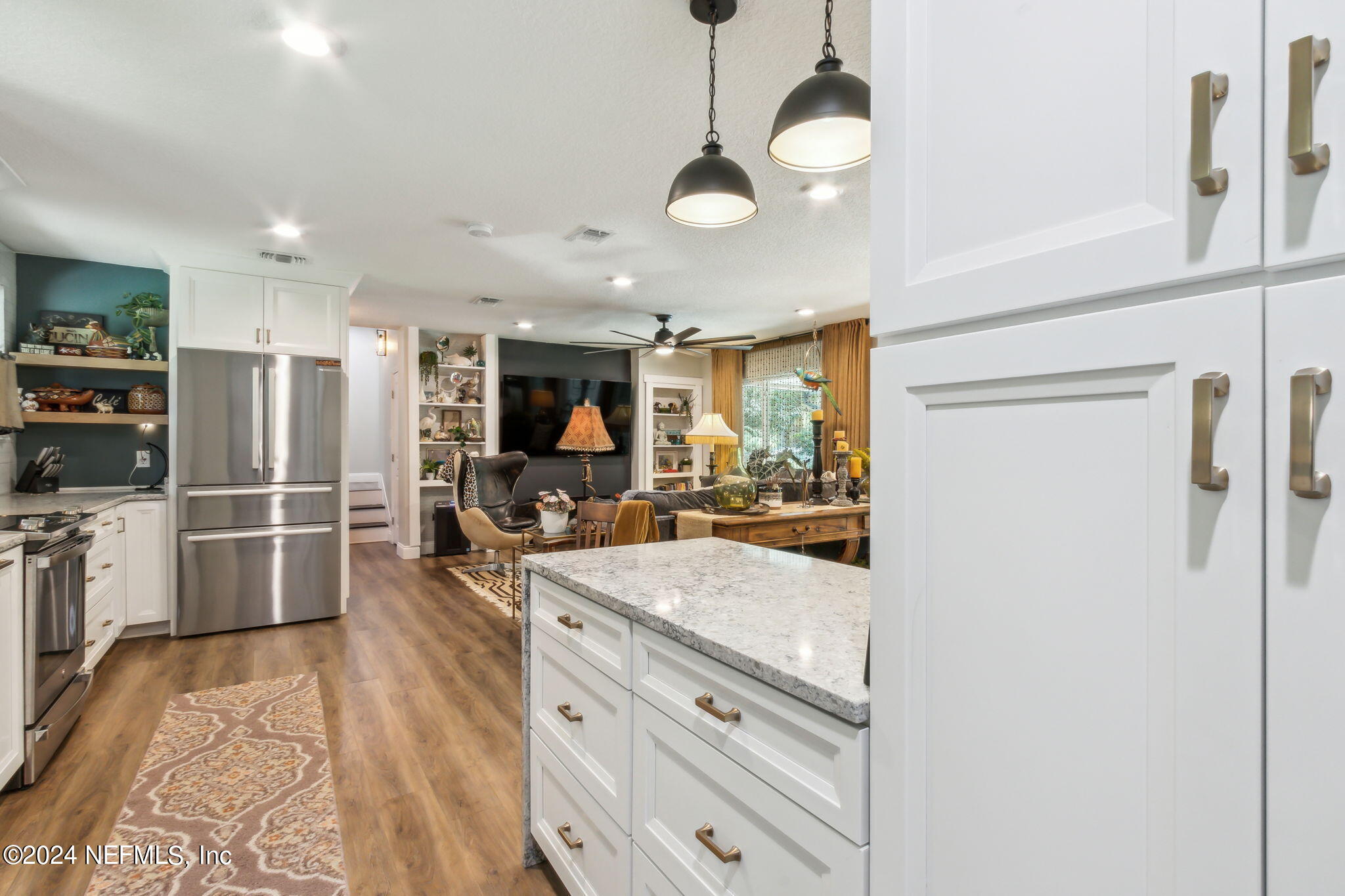 2636 Elbow Road Orange Park, FL 32073 - Photo 15 of 43 a kitchen with stainless steel appliances granite countertop a refrigerator and a stove top oven