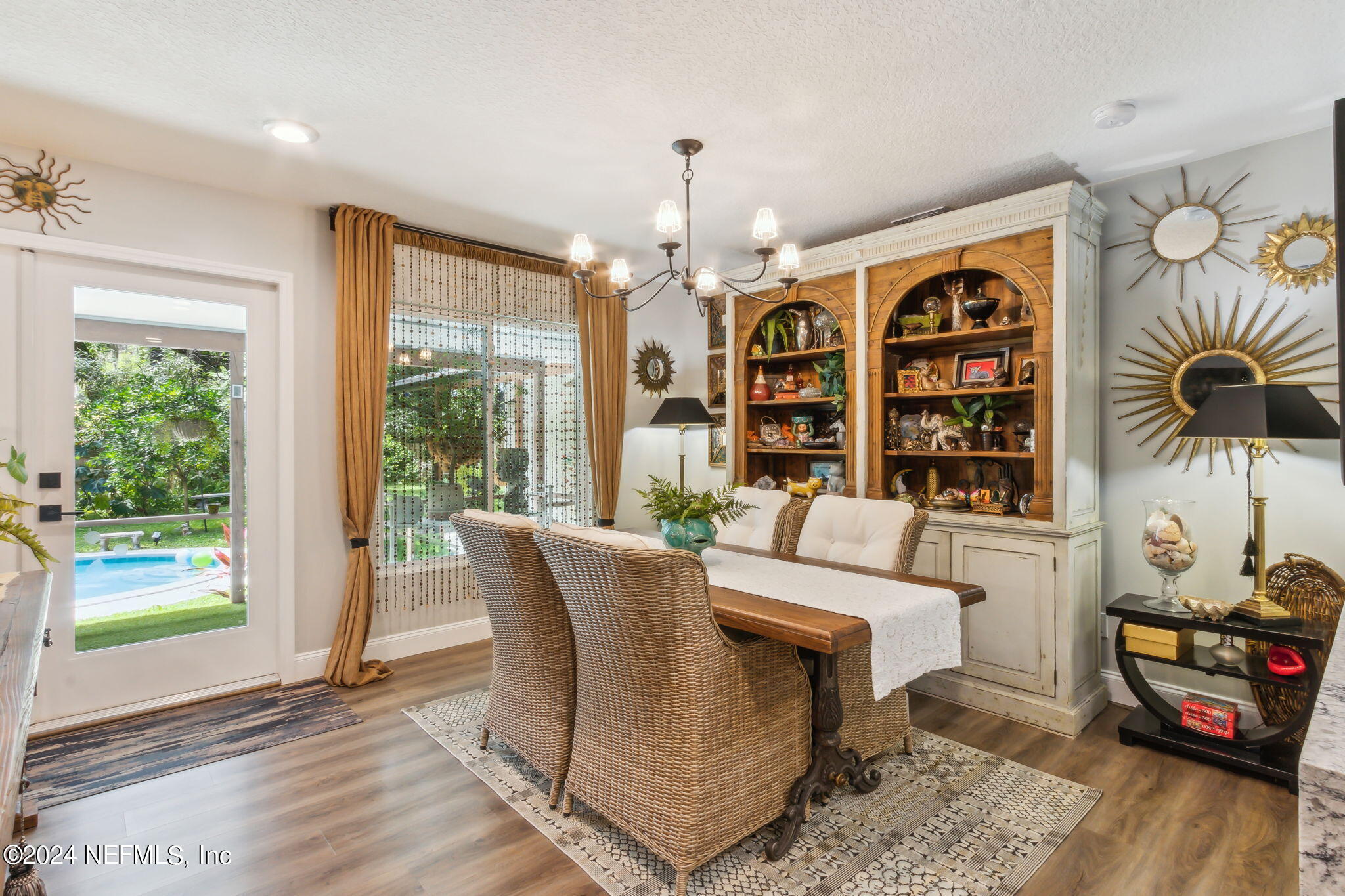 2636 Elbow Road Orange Park, FL 32073 - Photo 17 of 43 a living room with furniture a window and a flat screen tv