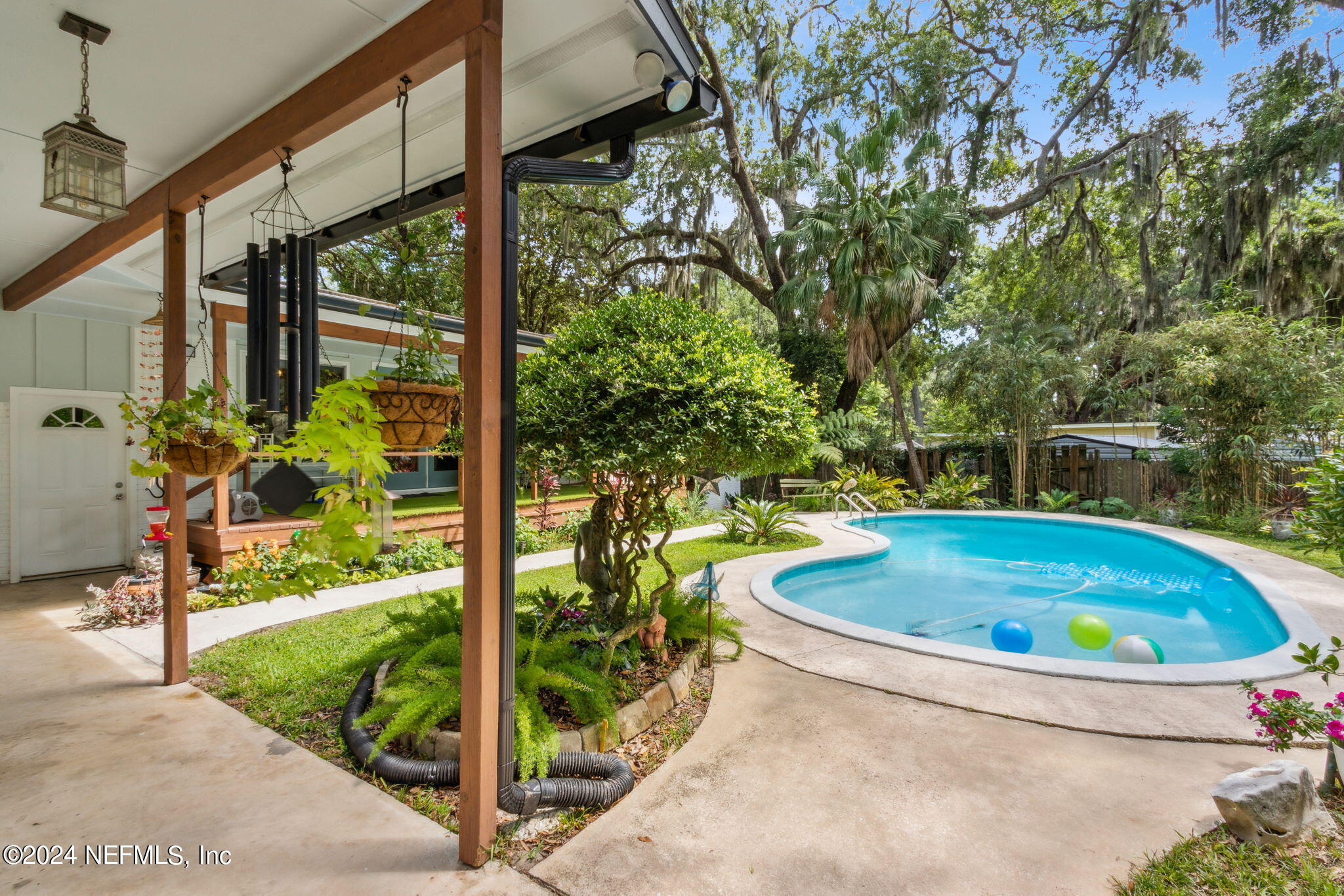 2636 Elbow Road Orange Park, FL 32073 - Photo 29 of 43 a view of a swimming pool with a patio