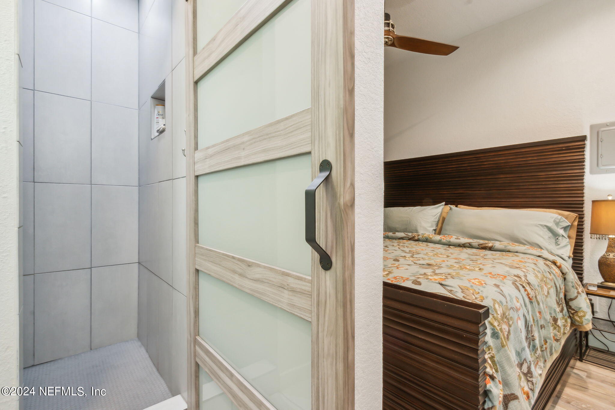 2636 Elbow Road Orange Park, FL 32073 - Photo 37 of 43 a bathroom with a bathtub and shower