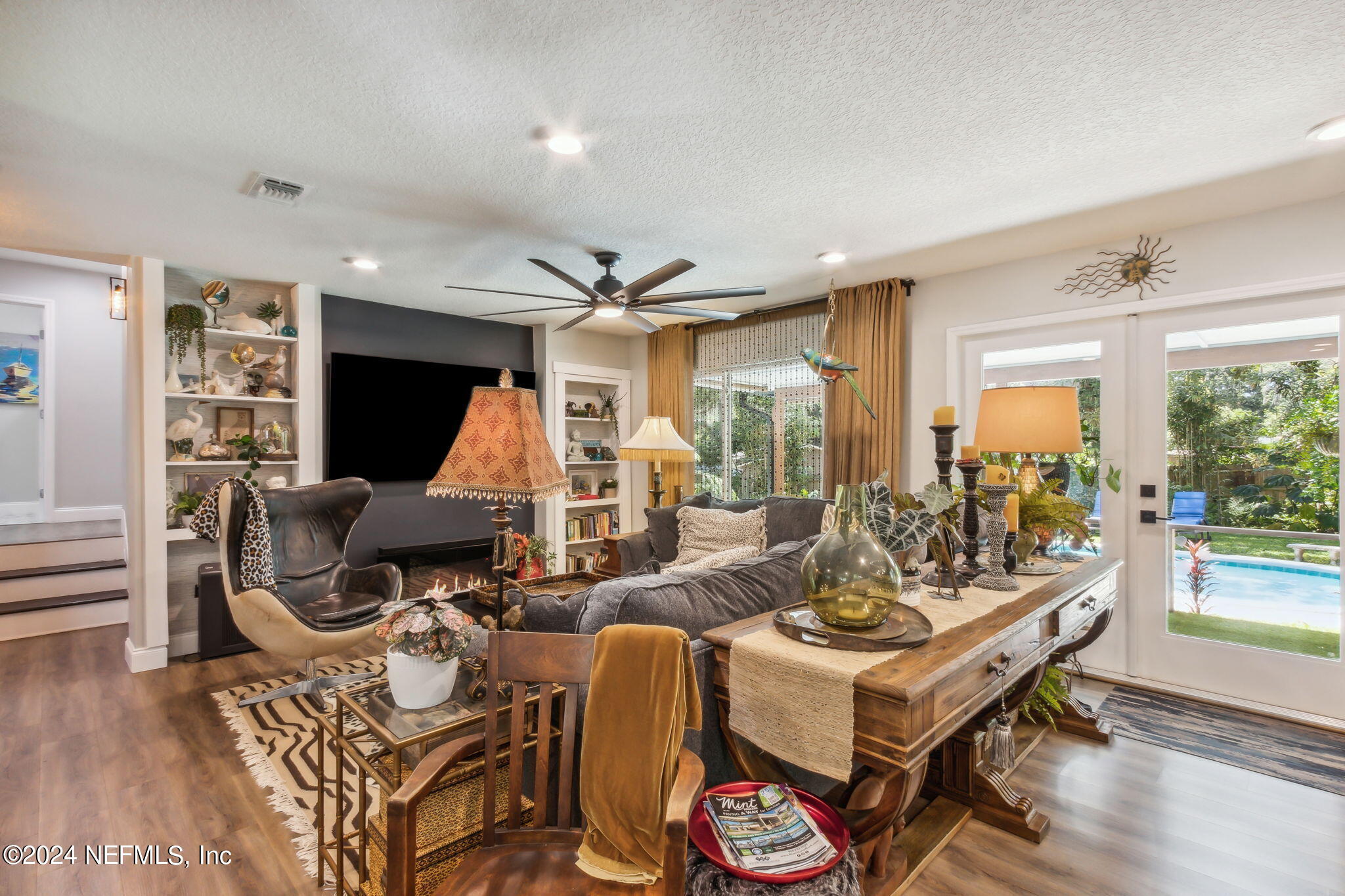 2636 Elbow Road Orange Park, FL 32073 - Photo 9 of 43 a living room with furniture a rug and a large window