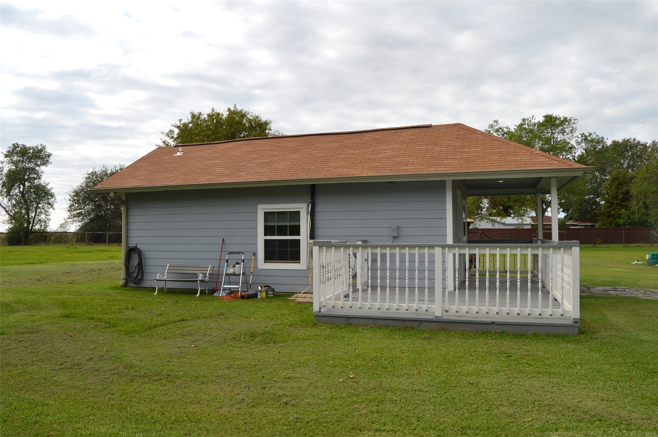 29315 Burton Cemetery Road Waller, TX 77484 - Photo 19 of 22 a front view of a house with garden