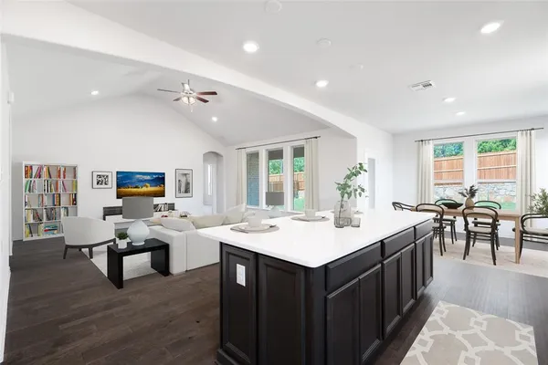 a living room with furniture and a table