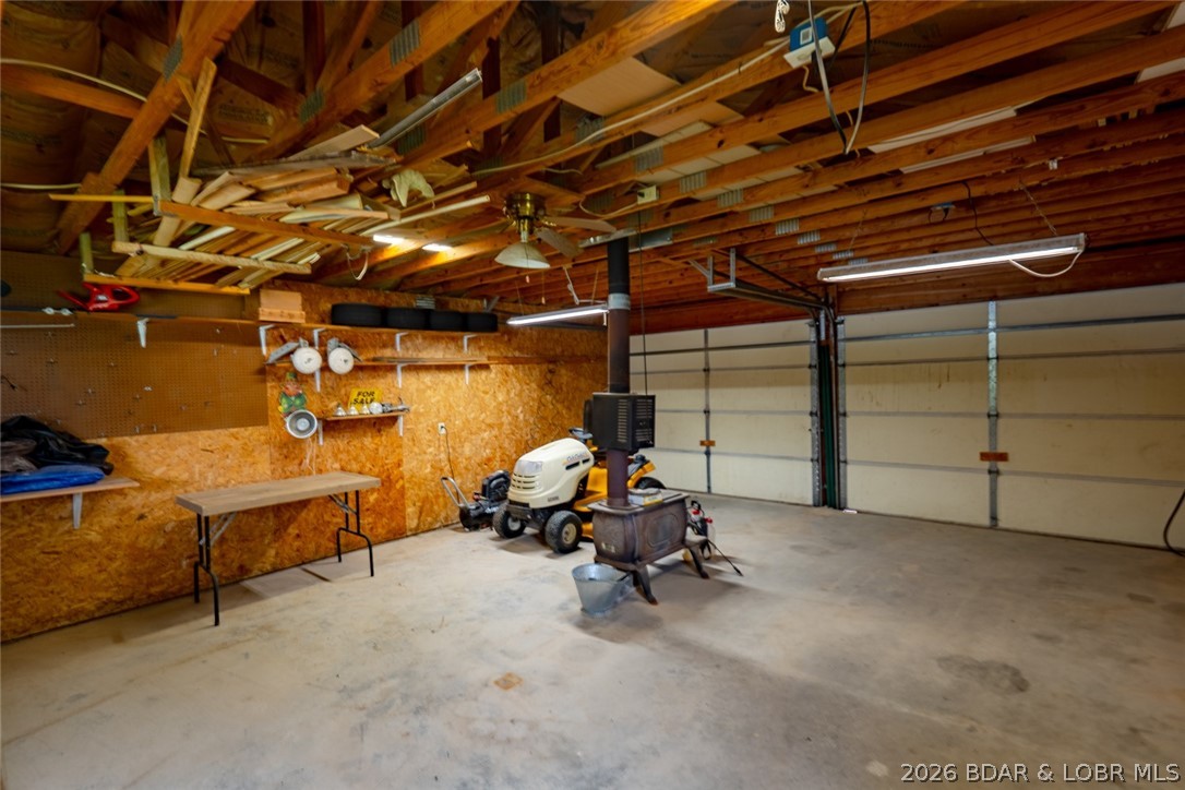 3135 Lick Creek Road Edwards, MO 65326 - Photo 80 of 94 Plenty of room to park 2 vehicles and have a work