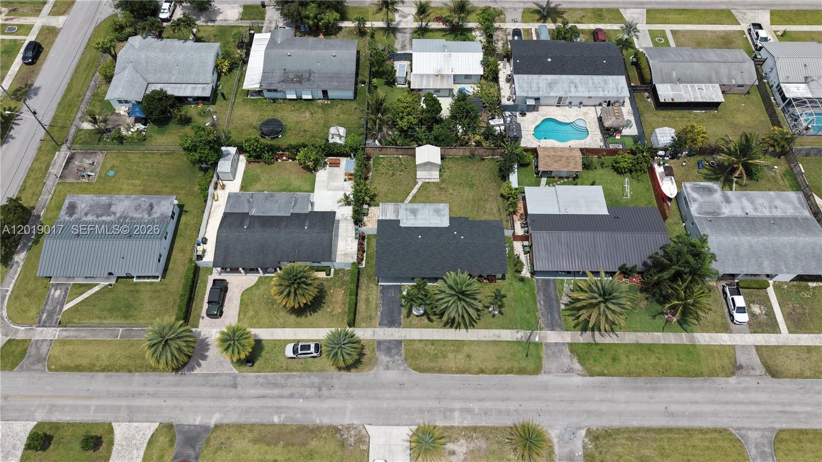 731 Northwest 17th Street Homestead, FL 33030 - Photo 29 of 29 an aerial view of residential houses with outdoor space