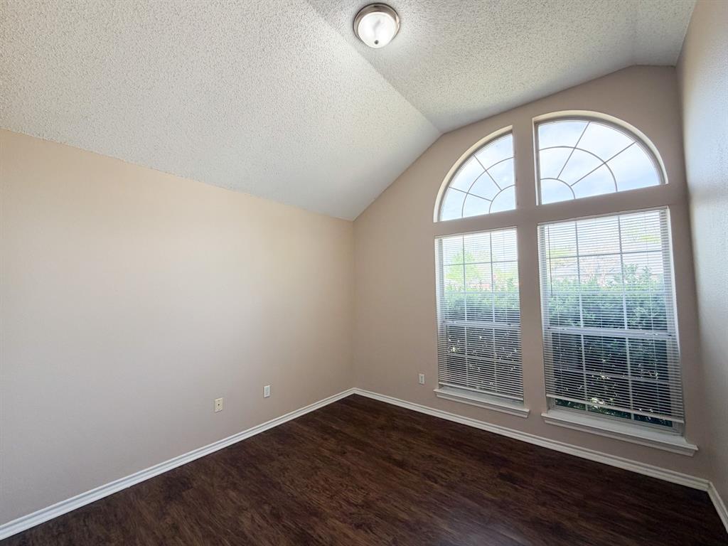 1000 Short Line Boulevard Midlothian, TX 76065 - Photo 13 of 23 an empty room with wooden floor and windows