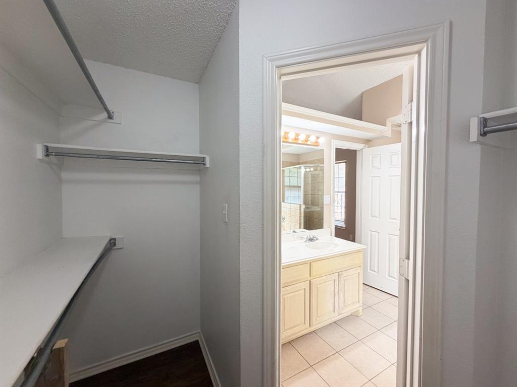 1000 Short Line Boulevard Midlothian, TX 76065 - Photo 21 of 23 a bathroom with a sink and a mirror
