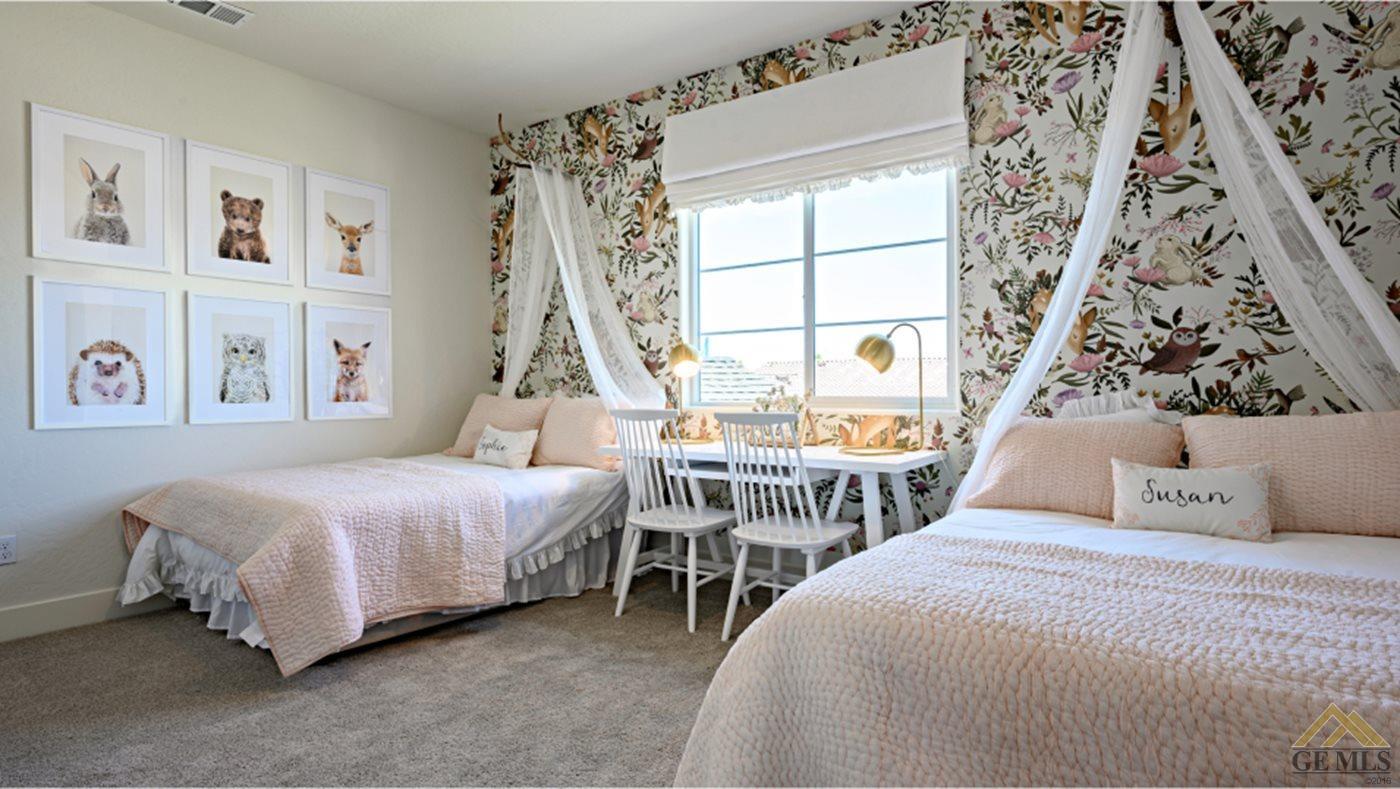Undisclosed Address Bakersfield, CA 93313 - Photo 12 of 14 a bedroom with a large bed and a window
