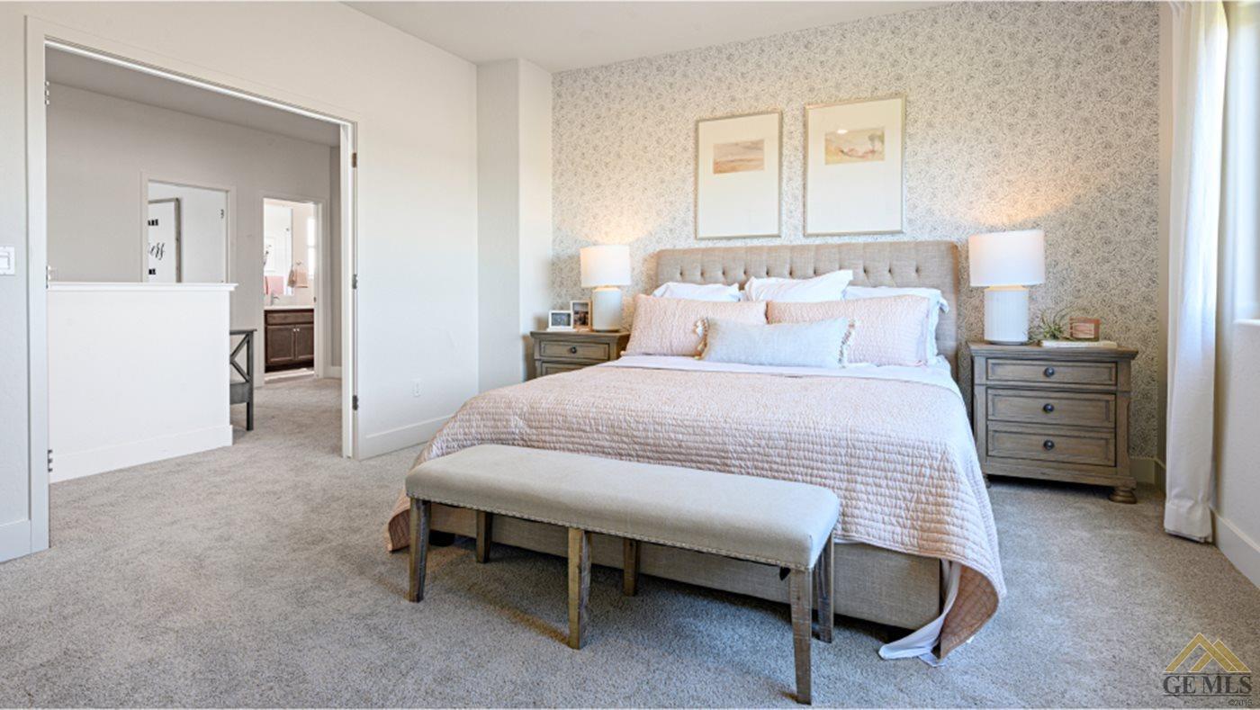 Undisclosed Address Bakersfield, CA 93313 - Photo 8 of 14 a bedroom with a bed and a cabinets