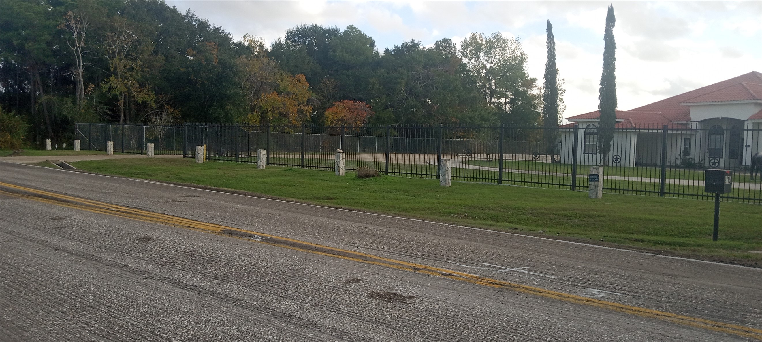12231 Perry Road Houston, TX 77070 - Photo 9 of 11 The house next door on Cypress North Houston.