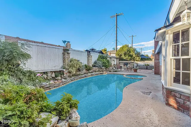 a view of a house with a swimming pool