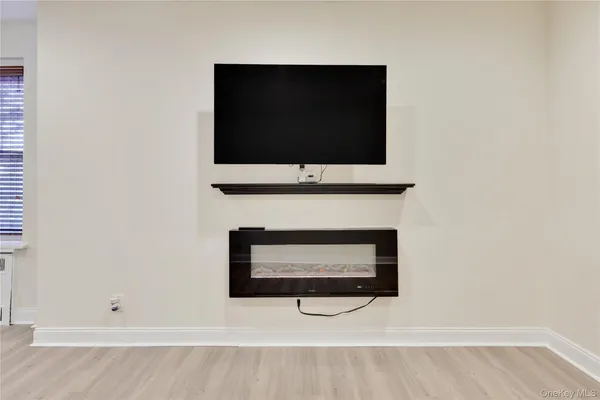 a living room with a fireplace