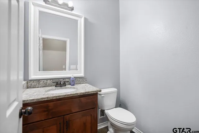 a house with swimming pool in front of it