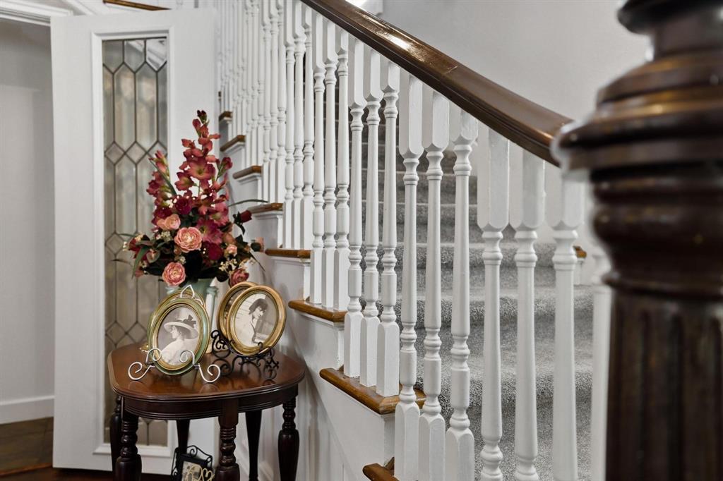 304 East 9th Street Bonham, TX 75418 - Photo 16 of 39 a view of a hallway with wooden floor and a potted plant
