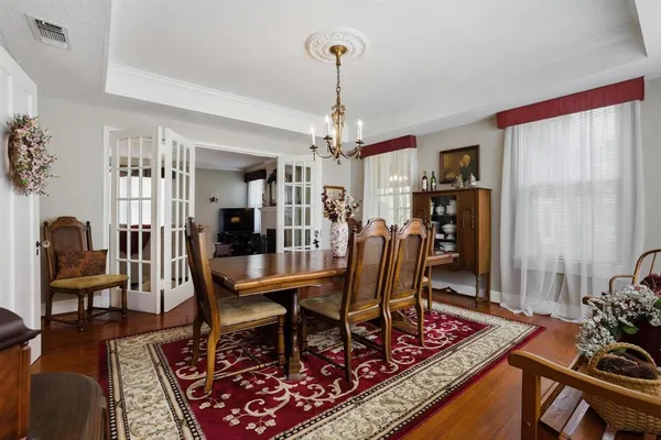 a view of a dining room with furniture