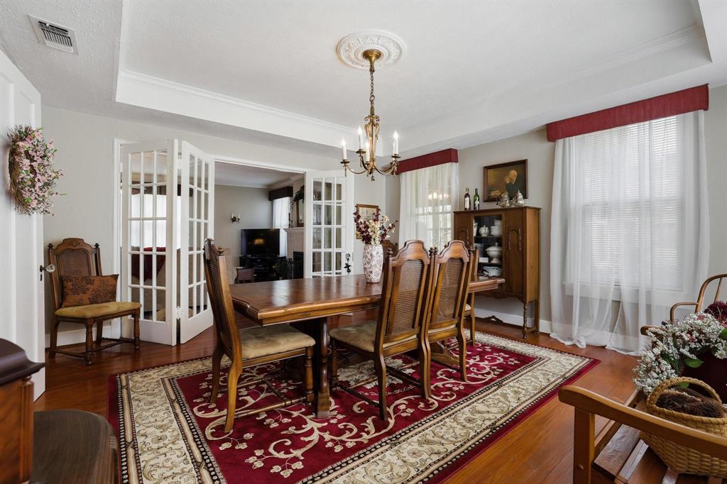 304 East 9th Street Bonham, TX 75418 - Photo 8 of 39 a view of a dining room with furniture