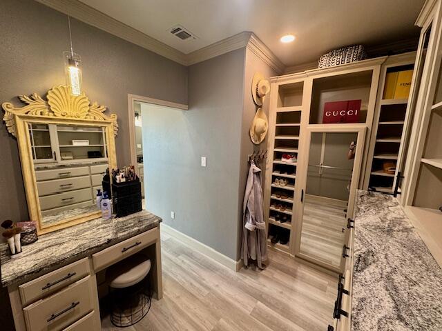 4028 125th Street Lubbock, TX 79423 - Photo 18 of 44 a view of walk in closet with clothes and shoes