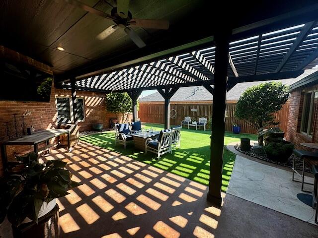 4028 125th Street Lubbock, TX 79423 - Photo 26 of 44 a patio with table and chairs